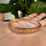 Bracelet Cartier Love en or rose 18 carats, nouvelle version, taille 16, avec boîte et papiers - B4000