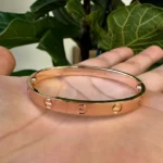 Bracelet Cartier Love en or rose 18 carats, nouvelle version, taille 16, avec boîte et papiers - B4000