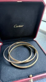 Bracelet jonc Cartier Trinity Tricolore en or 18 carats, modèle classique - Image 11