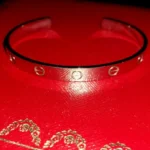 Bracelet manchette Love en or blanc Cartier 18