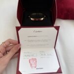 Bracelet CARTIER Love taille 17, or jaune, ensemble comple